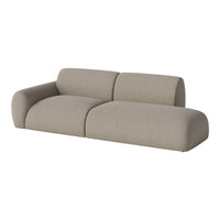 Light gray textured sofa with subtle stripes and smooth curves, perfect for modern living spaces.