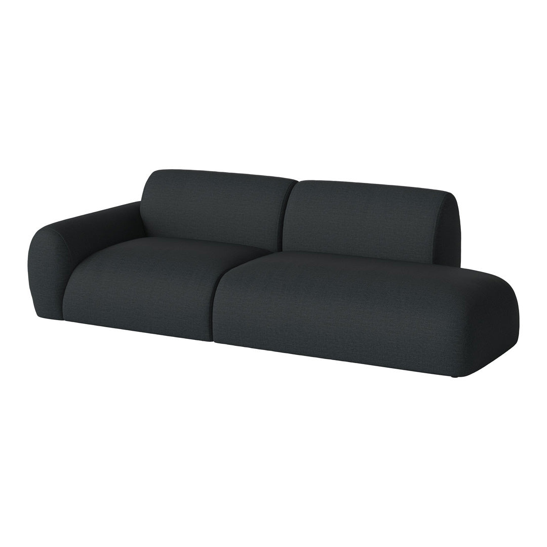 Dark gray modern sofa with a textured fabric, featuring a sleek minimalist design and soft curves.