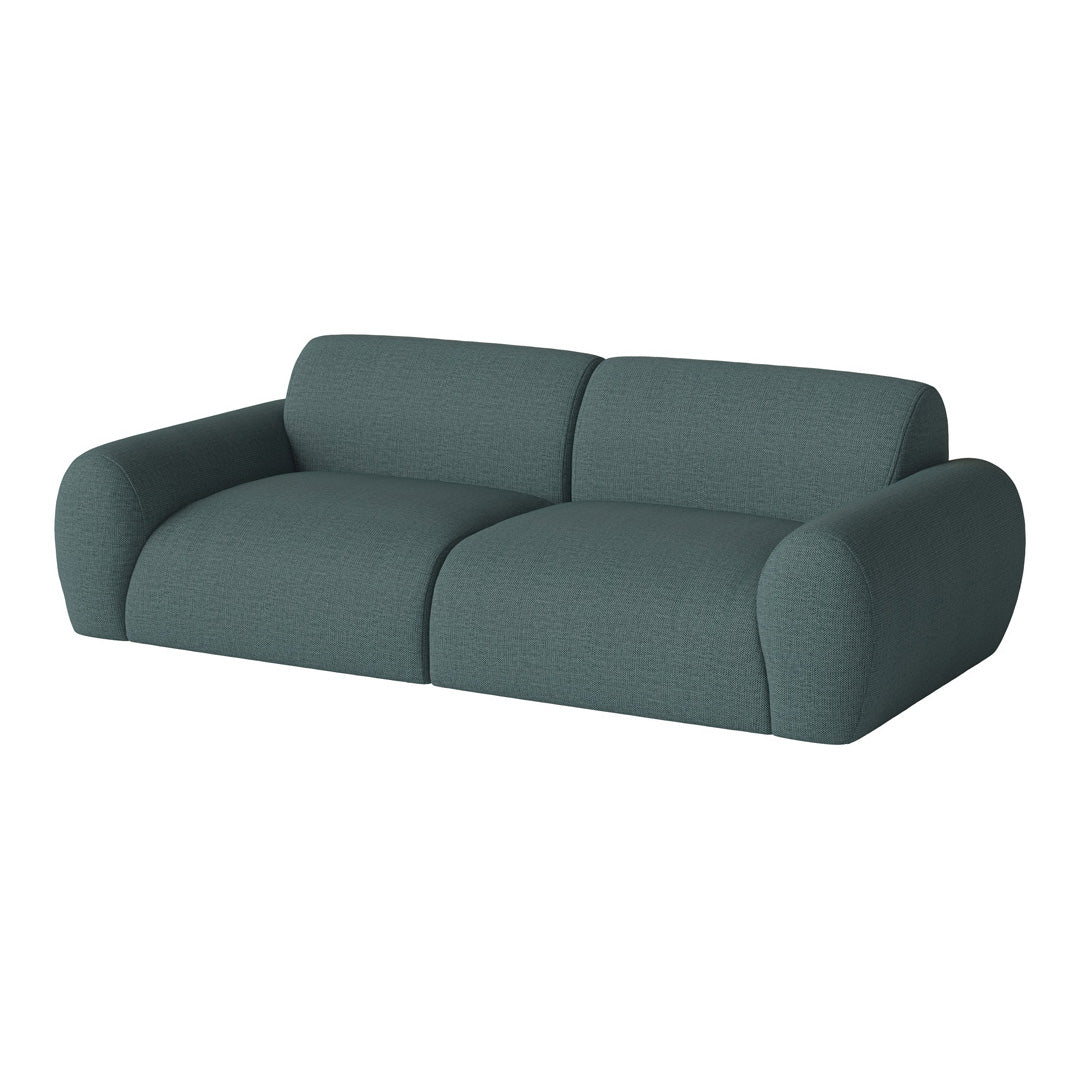 Teal fabric sofa with a smooth, textured pattern, featuring rounded edges for a modern look.