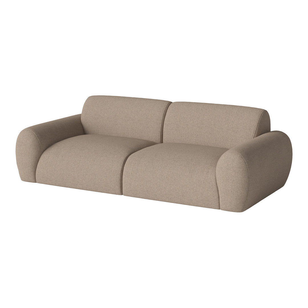 Beige curved sectional sofa with a soft texture and minimalistic design, perfect for modern living spaces.