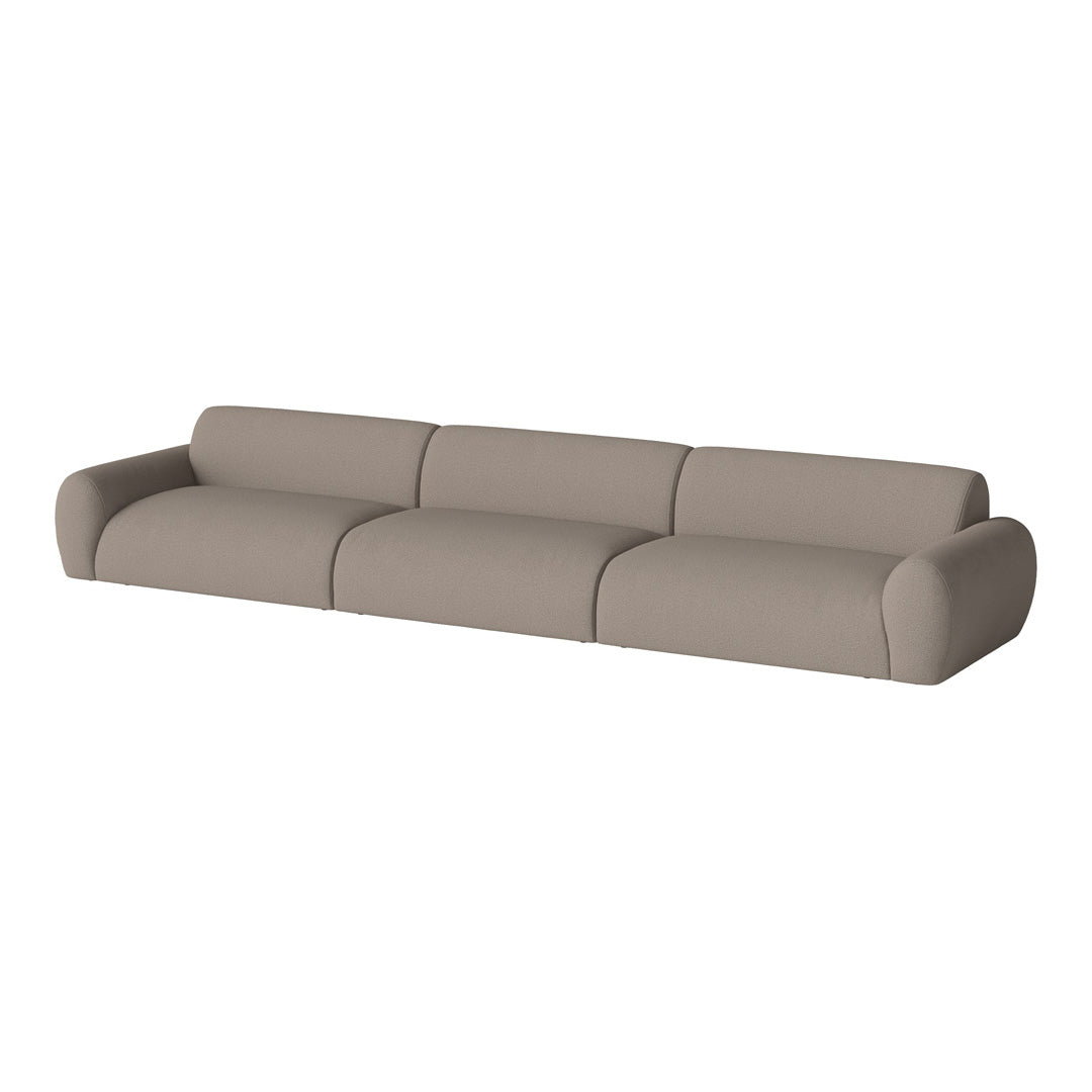 Beige, streamlined sofa with a soft texture and rounded edges, perfect for modern living spaces.