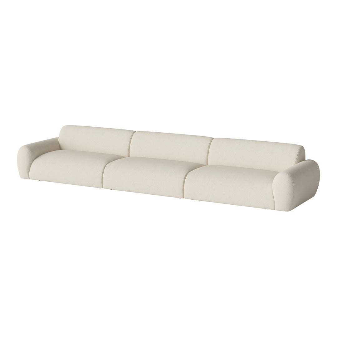 Cream-colored modern sofa with a smooth, minimalist design and rounded edges. Perfect for contemporary interiors.