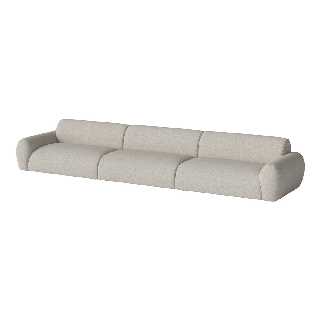 Light beige modern sofa with a smooth, textured fabric featuring a minimalist design and soft, rounded edges.