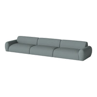 Modern light gray sofa with smooth, curved lines and a minimalist design, perfect for contemporary interiors.