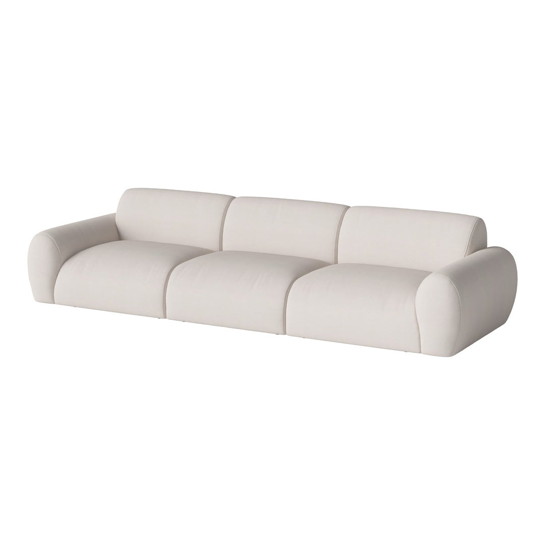 Contemporary white sofa with smooth, rounded curves and a minimalist design, perfect for modern interiors.
