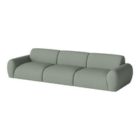 Soft sage green three-seater sofa with smooth, rounded cushions and a minimalist design. Ideal for modern interiors.