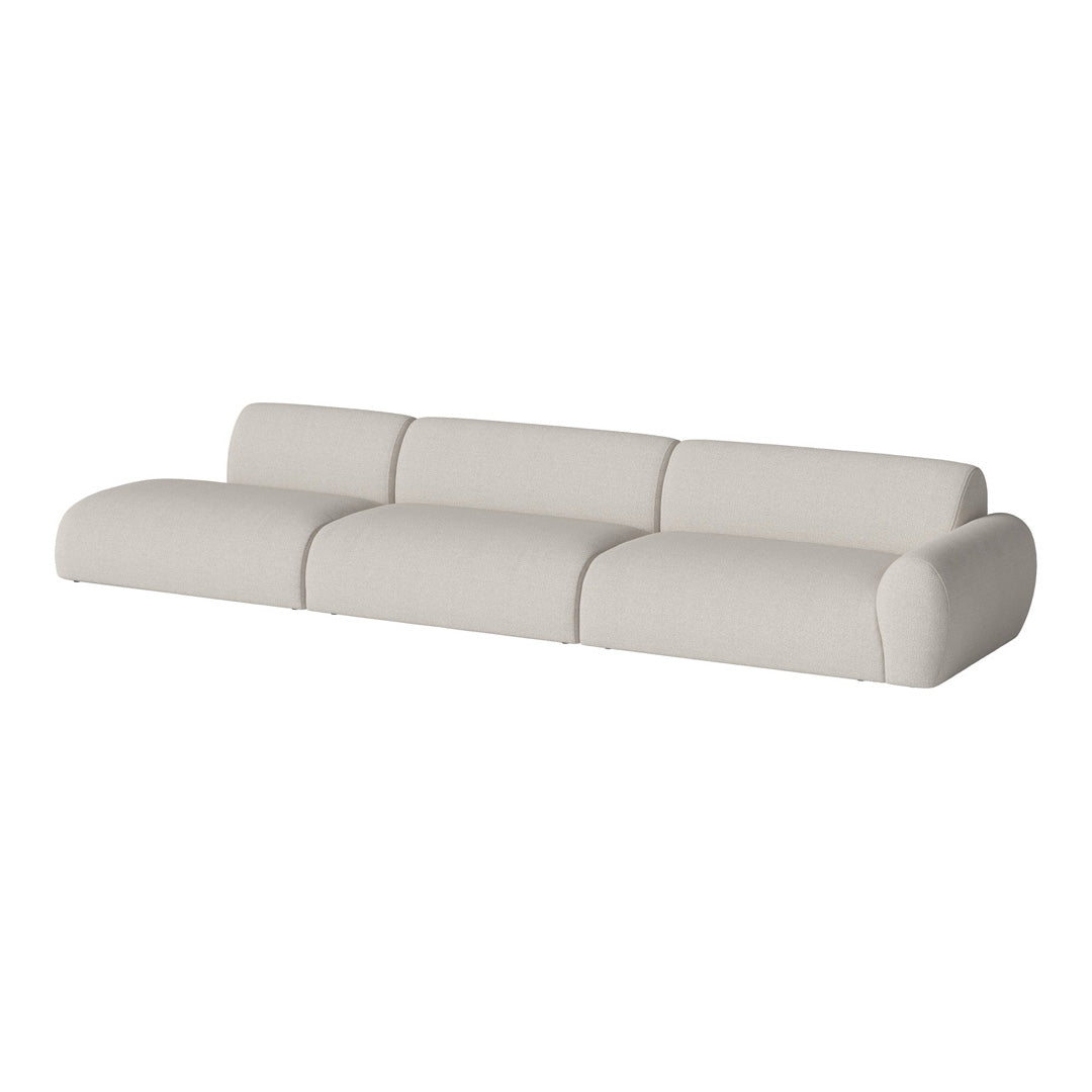 Light beige modern sofa with a smooth, minimalist design and soft, rounded edges for a cozy look.