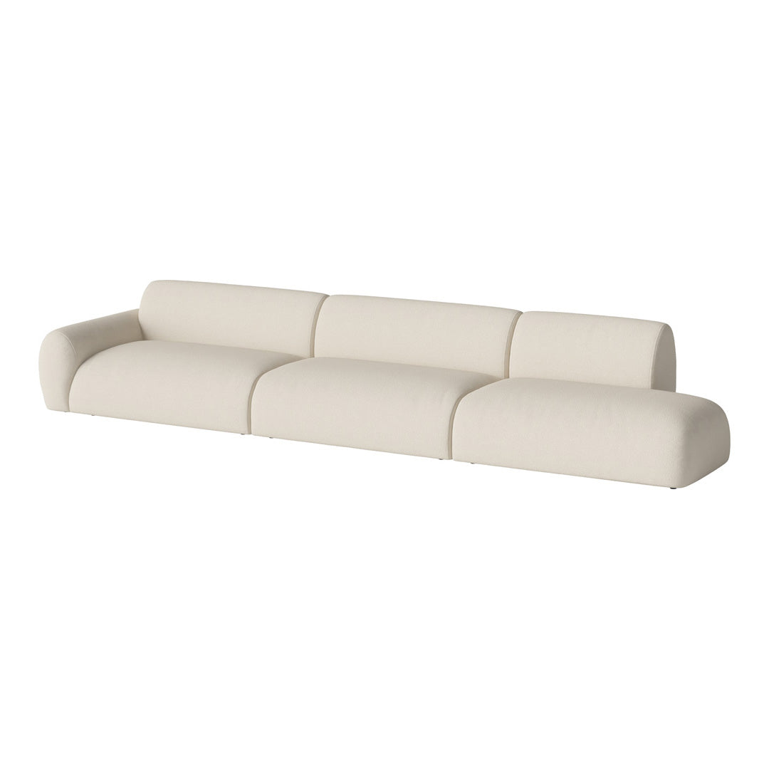 Modern cream sectional sofa with a sleek, minimalist design and soft, textured fabric. Perfect for contemporary interiors.