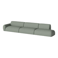 Contemporary green modular sofa with smooth, curved lines and a textured fabric finish. Perfect for modern living spaces.