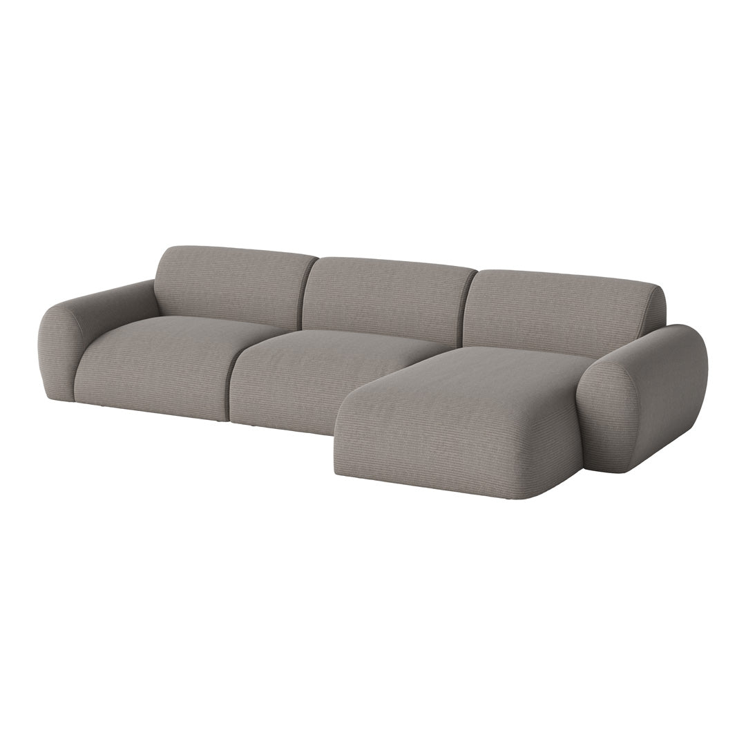 Gray sectional sofa with smooth fabric and rounded edges, featuring a contemporary design and subtle texture.