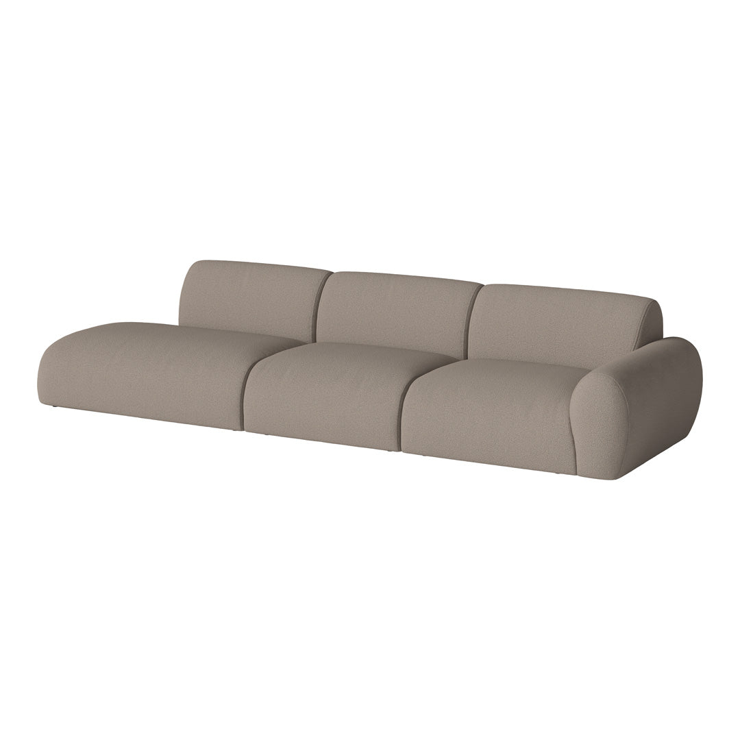 Light beige sofa with soft, smooth upholstery and rounded edges, perfect for modern living spaces.