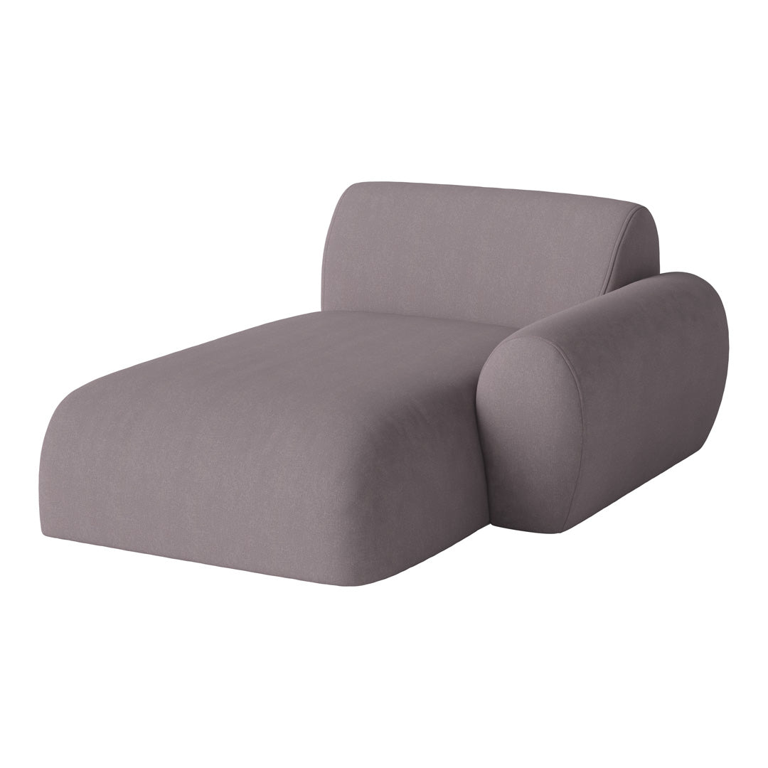 Gray fabric chaise lounge with smooth, minimalist design and soft curves, perfect for modern interiors.