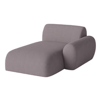 Gray fabric chaise lounge with smooth, minimalist design and soft curves, perfect for modern interiors.