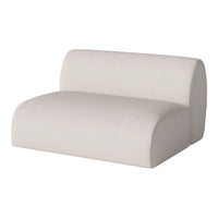Minimalist beige sofa with smooth, textured upholstery and rounded edges, perfect for modern home decor.