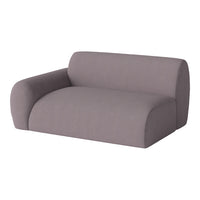 Stylish gray fabric sofa in a modern design with smooth, rounded edges and a minimalist aesthetic.
