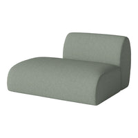 Soft green lounge chair with a textured, minimalist design for a modern aesthetic.