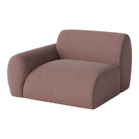 Plush, modern chair in muted mauve with a subtle ribbed texture for a cozy yet stylish look.