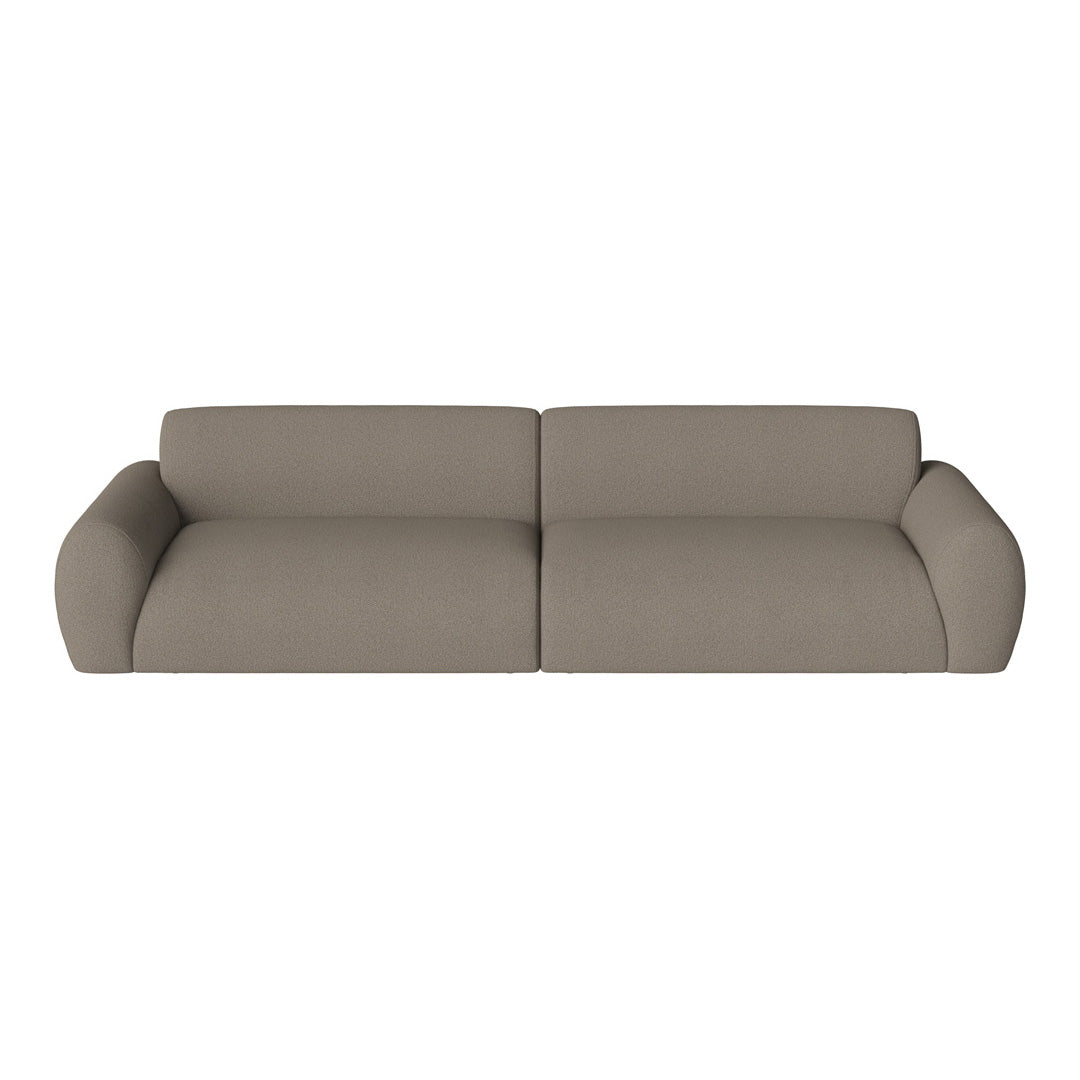 Soft beige sofa with a smooth, textured finish and rounded arms, ideal for elegant and modern interiors.