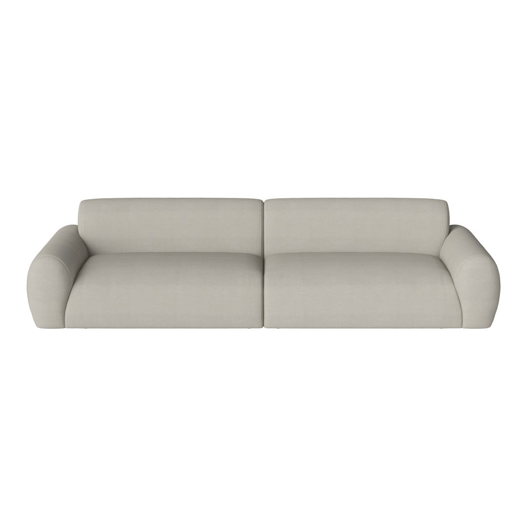 Light beige sofa with a smooth, minimalist design and plush, rounded arms.