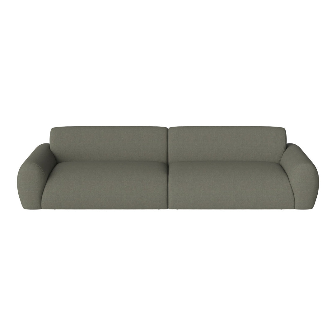 Modern green sofa with a textured, soft fabric and rounded arms, ideal for stylish living spaces.