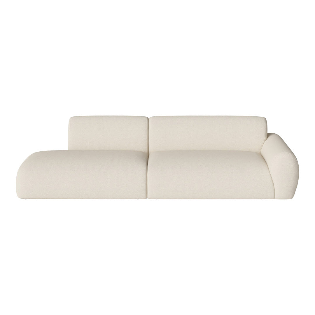 "Soft cream-colored modern sofa with smooth, minimalist design, perfect for contemporary decor."