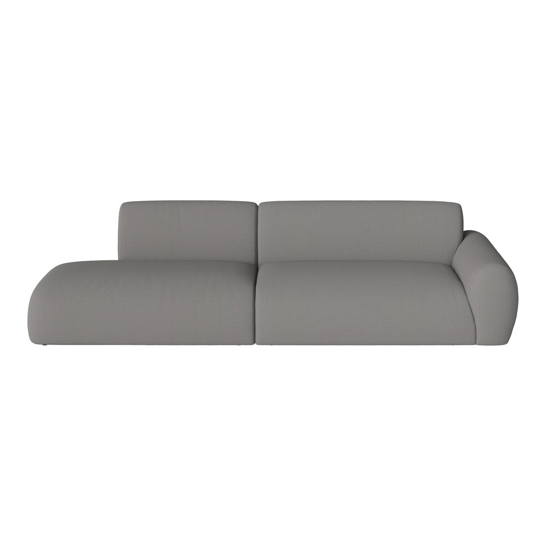 Modern light gray sectional sofa with smooth, minimalist design. Ideal for contemporary living spaces.
