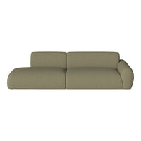 Olive green sofa with a soft, textured fabric; modern, minimalist design; curved armrests and seamless cushions.