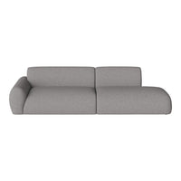Gray upholstered sectional sofa with a smooth, modern fabric texture and minimalist design. Perfect for stylish interiors.