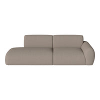 Beige sofa with a soft, textured fabric and contemporary, curved design. Perfect for modern living spaces.