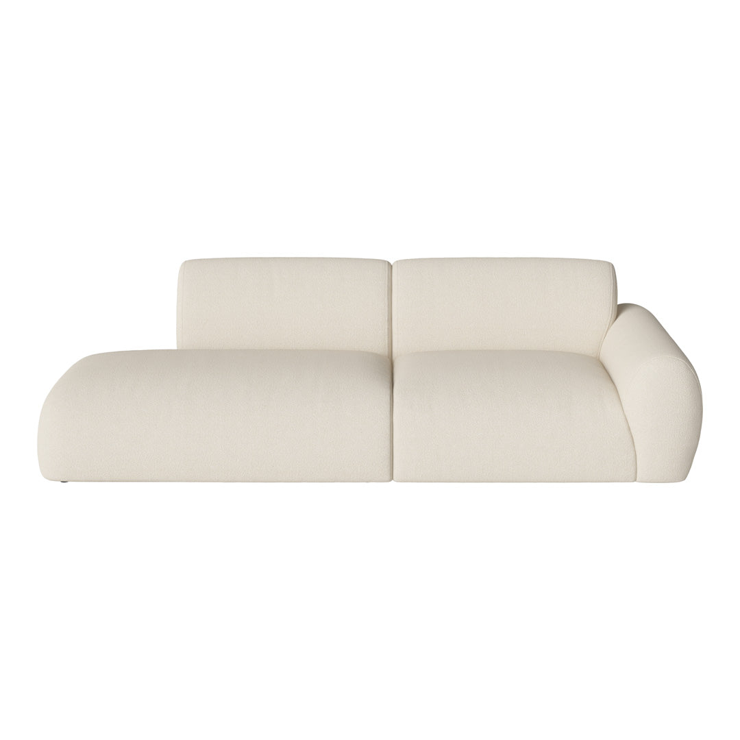 Cream-colored modern sofa with soft, textured fabric and a minimalist design. Ideal for neutral decor.