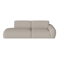 Light beige modern sofa with a textured fabric and minimalist design, featuring soft, rounded edges.