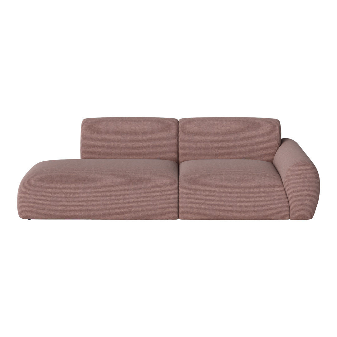 Modern pink textured sofa with smooth lines and understated elegance, perfect for contemporary living spaces.