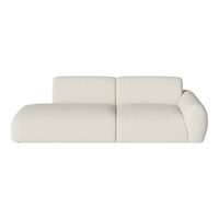 Cream-colored modern sofa with a smooth, textured fabric and contemporary curved design. Ideal for minimalistic decor.