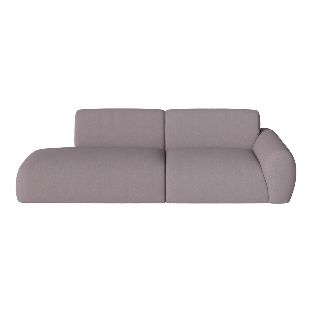 Soft lavender modern sofa with smooth, seamless contours and a minimalist design, perfect for contemporary interiors.