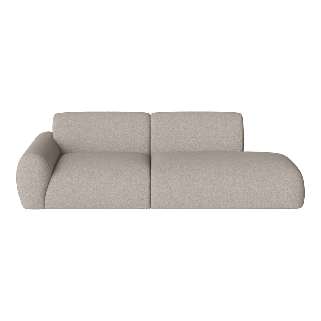 Beige modern sofa with smooth texture and contemporary curved design, perfect for stylish interiors.