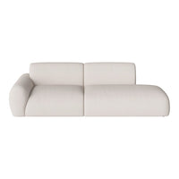 Elegant off-white sectional sofa with smooth, minimalist design and soft texture, perfect for modern interiors.