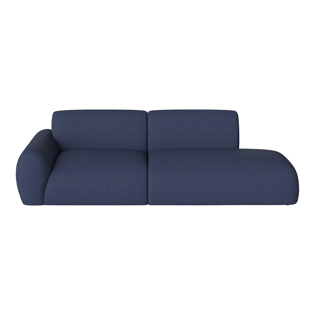 Navy blue sofa with a textured pattern, featuring a contemporary design and rounded shapes for a modern look.