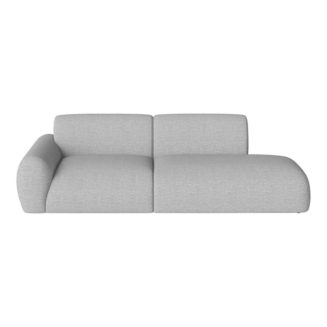 Light gray modular sofa with a textured fabric and smooth, rounded edges for a modern aesthetic.