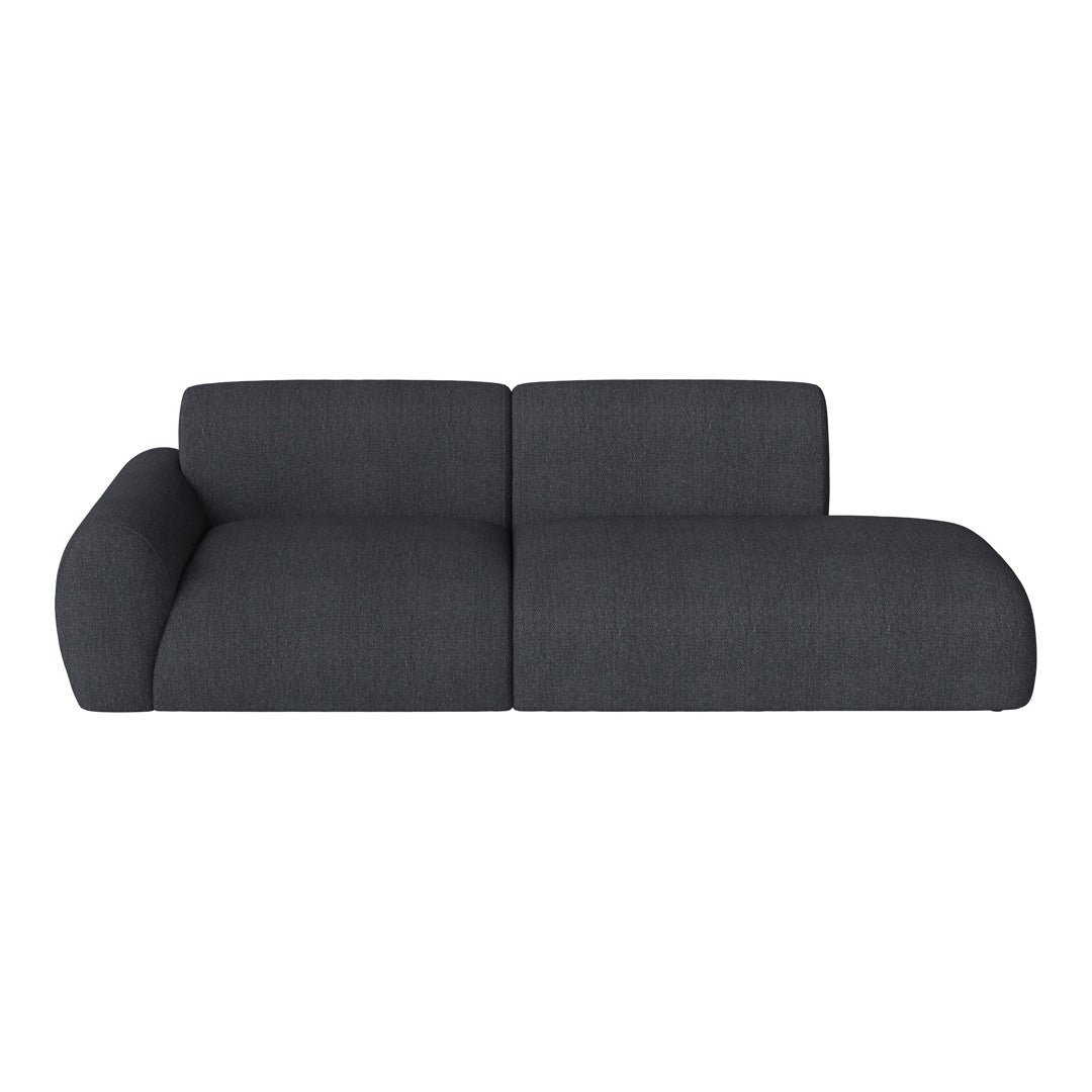 Dark gray modular sofa with a sleek, minimalist design and soft, textured fabric pattern. Perfect for modern spaces.