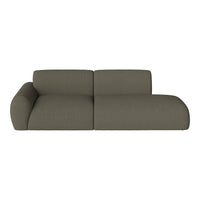 Olive green textured couch with a modern, minimalist design, featuring smooth curves and a cozy appearance.