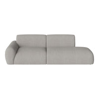 Light gray sectional sofa with a smooth fabric and rounded edges, offering a minimalist and modern design.