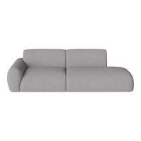 Contemporary gray sectional sofa with a smooth, textured fabric and rounded edges, ideal for modern living spaces.
