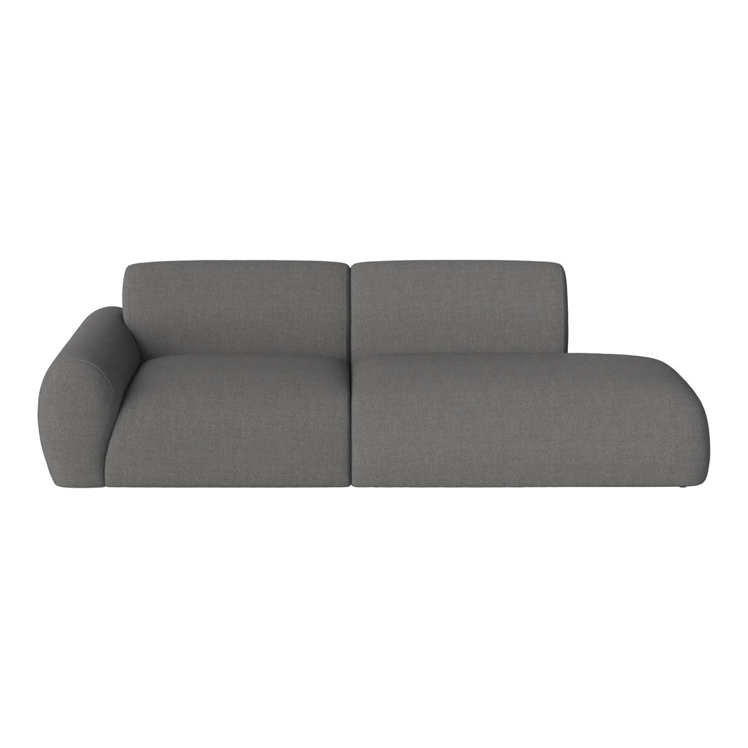 Gray upholstered sectional sofa with a modern, textured pattern and sleek curved outlines. Ideal for contemporary spaces.