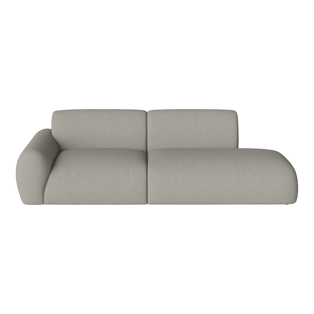 Modern gray sectional sofa with a smooth, neutral fabric and subtle texture, perfect for contemporary living spaces.