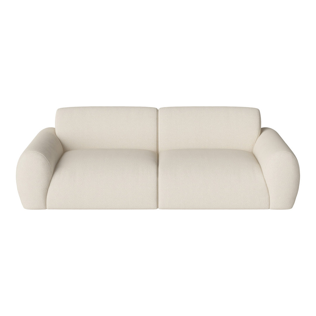 Cream-colored modern sofa with a smooth, textured fabric and rounded arms, perfect for minimalist decor.