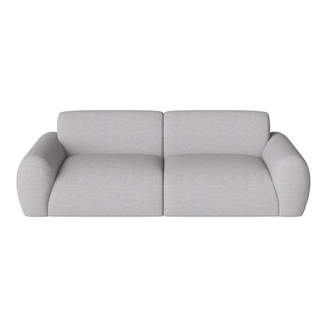 Light gray sofa with a smooth texture and minimal pattern, featuring plush, rounded armrests.