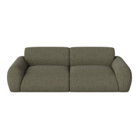 Olive green sofa with a textured stripe pattern, featuring a modern, rounded silhouette and soft upholstery.