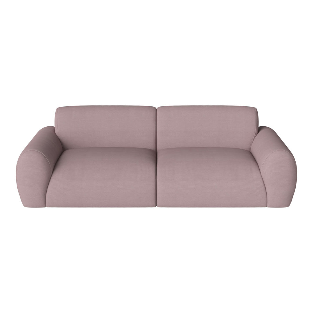 Light pink modern sofa with smooth, curved lines, perfect for stylish living room decor.