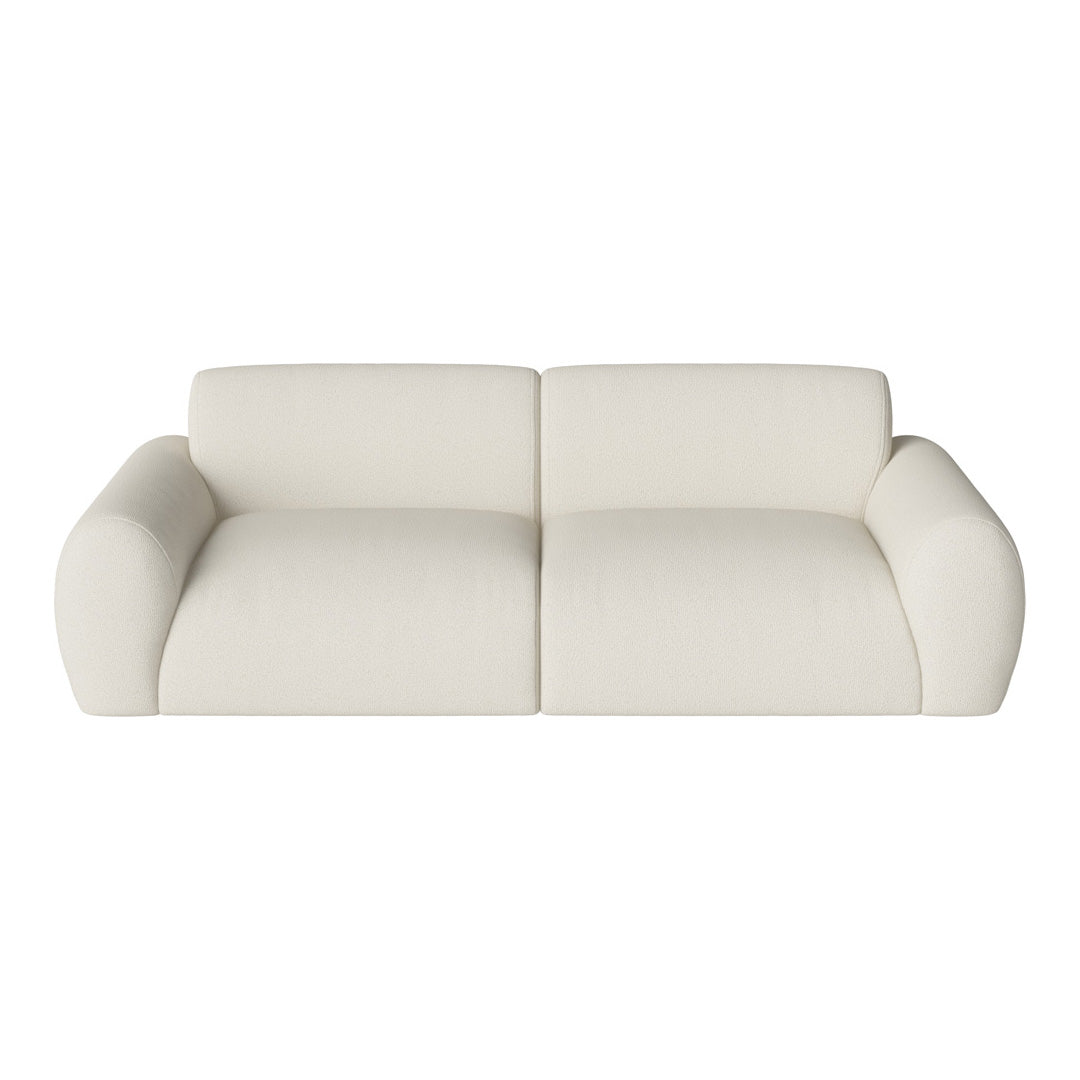 Cream-colored modern sofa with soft, textured upholstery and a minimalist design. Ideal for contemporary interiors.