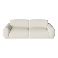 Cream-colored modern sofa with soft, textured upholstery and a minimalist design. Ideal for contemporary interiors.